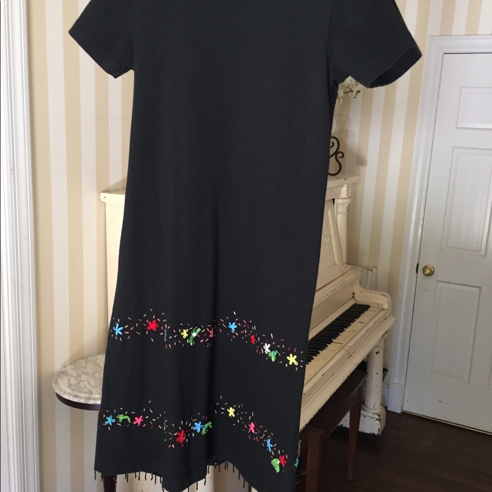 Hand stitched flowers, beaded fringe hem